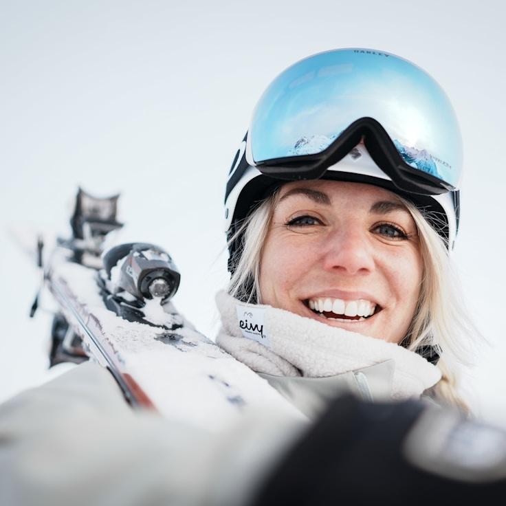 Avery Kim, Lead Design Curator at EmeraldOceanView, reviewing corporate floral arrangements